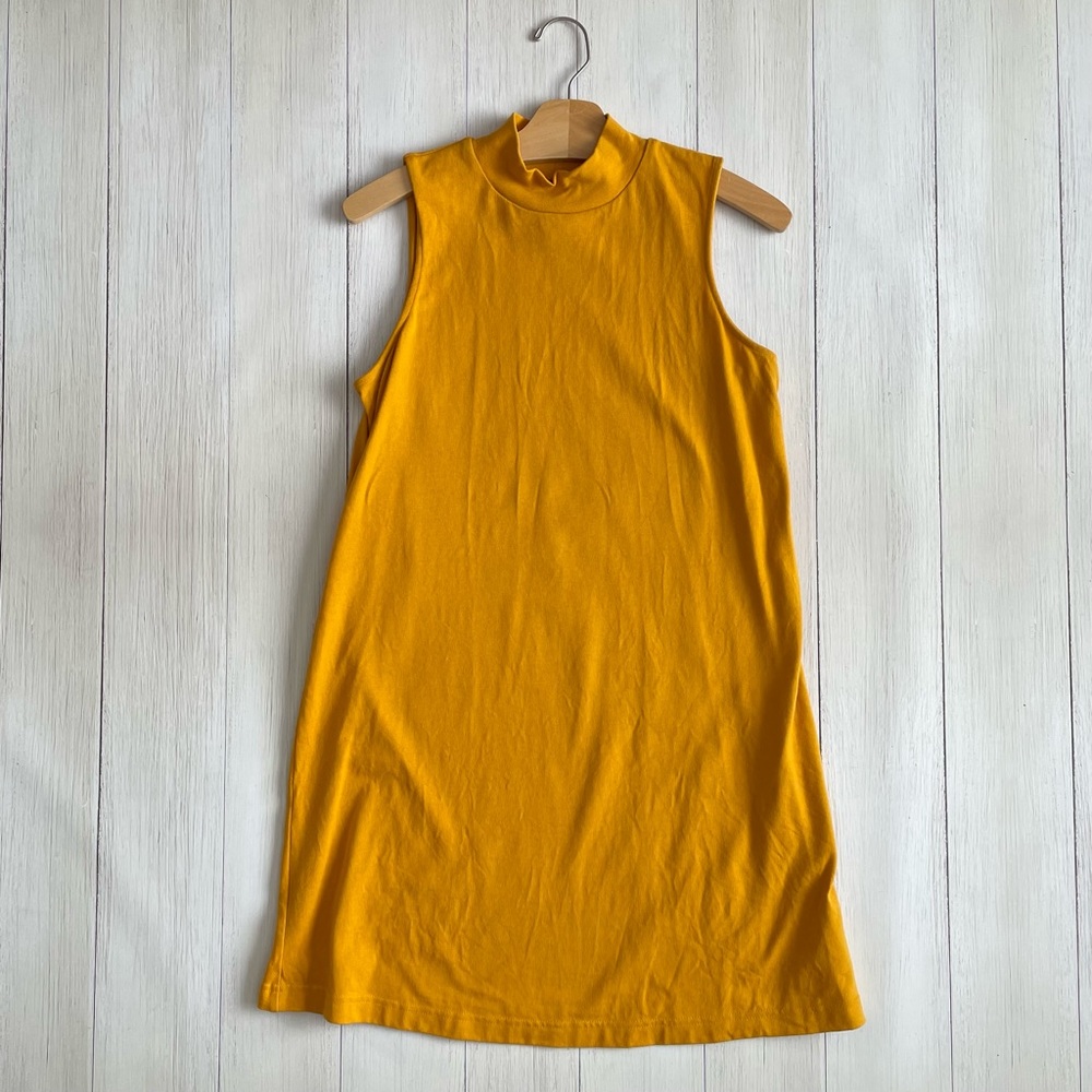 Yellow Gap Mockneck sleeveless dress.